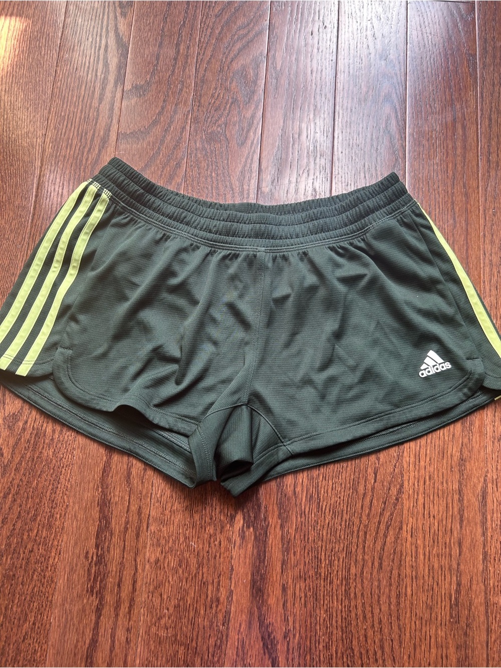 adidas Women's Olive Green Athletic Shorts with Yellow Stripes